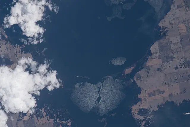 Aerial view of the lake and farmland from the ISS
